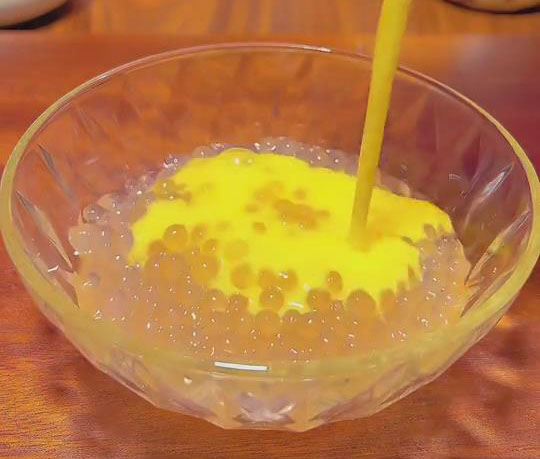 add your desired amount of sago pearls, mango and milk mixture