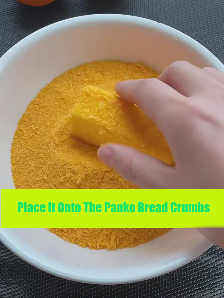 place it onto the panko bread crumbs