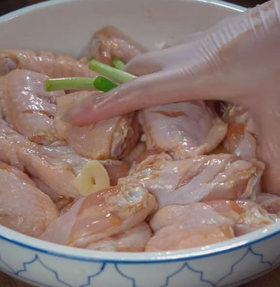Combine the ingredients well and massage them with the chicken wings to ensure even coverage