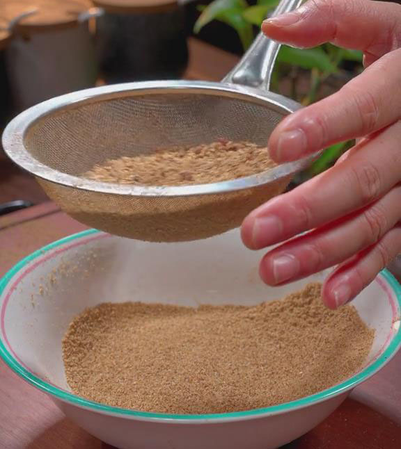 Use a sieve to separate the fine powder from the large granules