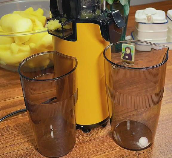 use a slow juicer to separate the juice from the pulp or residue1