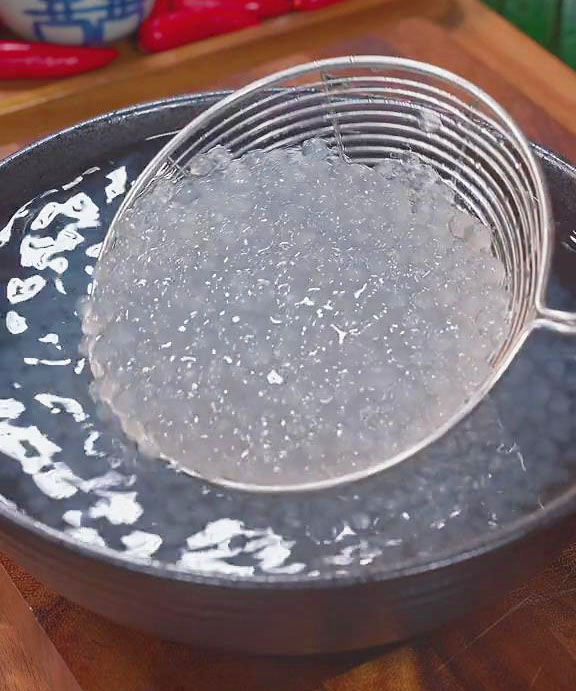 transfer the sago to a bowl and rinse in cold water