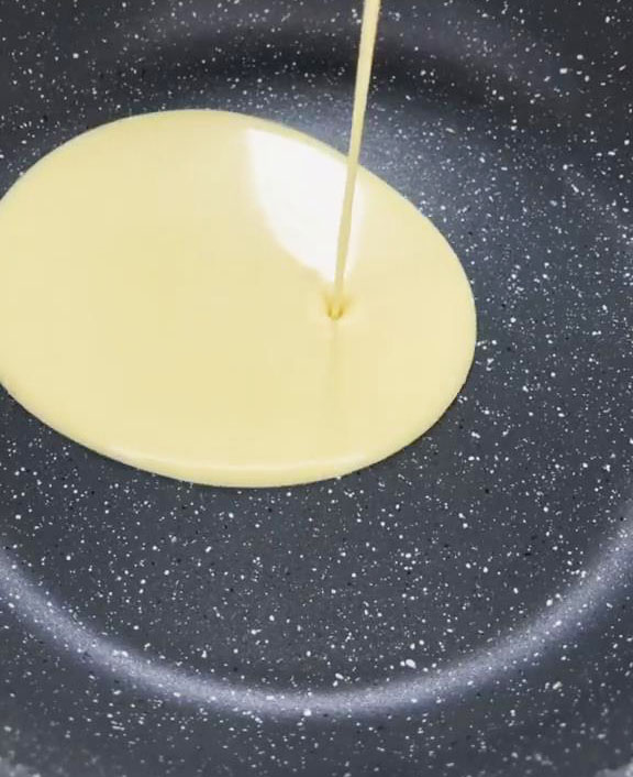 In a non stick pan, pour the pancake batter
