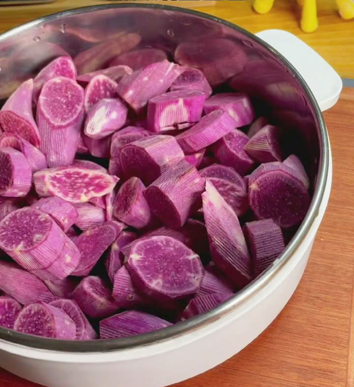 Place purple sweet potatoes in a steamer