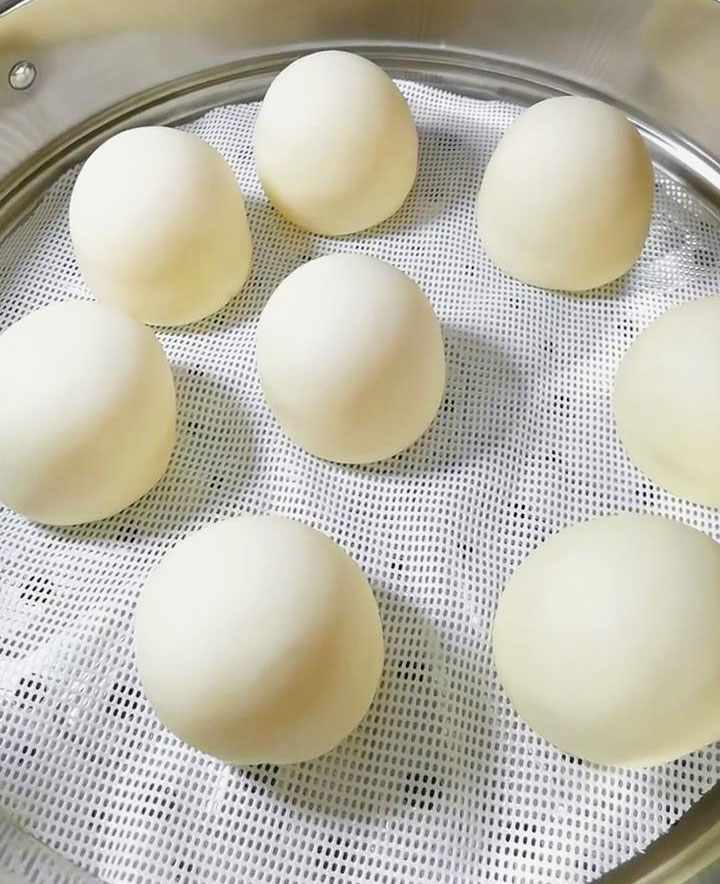 Place the buns in a steamer lined with parchment paper
