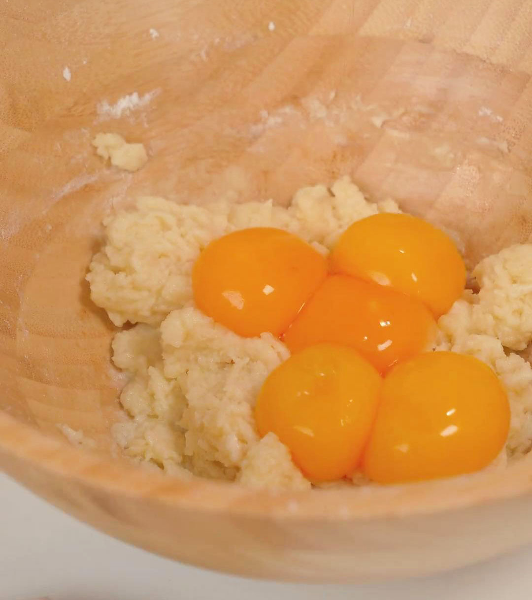 add 5 egg yolks