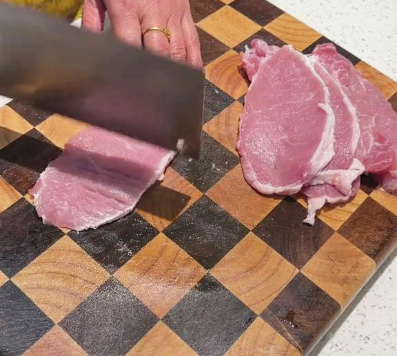 tenderize the pork on both sides