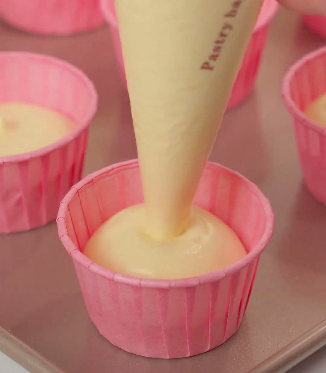 transfer the egg batter into the cupcake mold