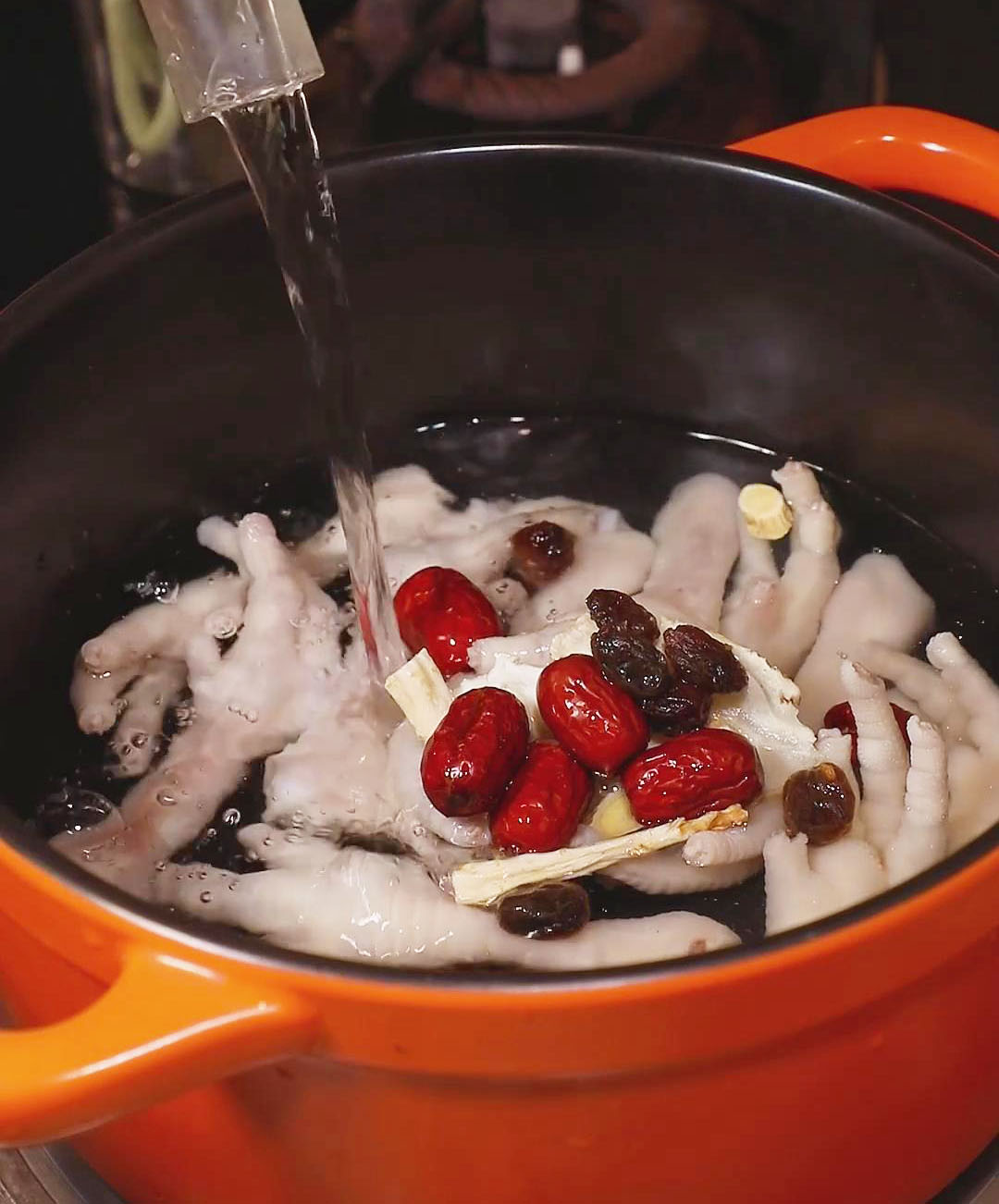 Add water to the pot with Chicken Feet