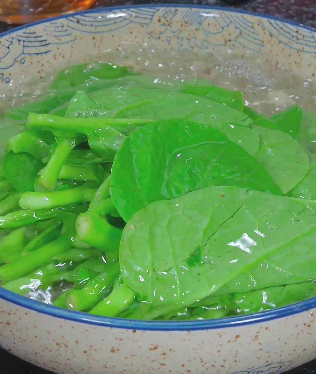 Clean the Malabar spinach with water