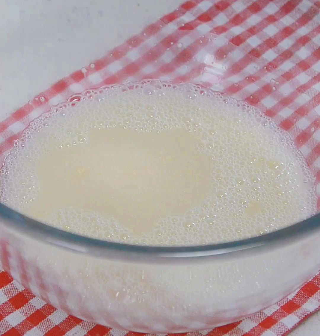 In a bowl, whisk water, sugar, yeast, and salt
