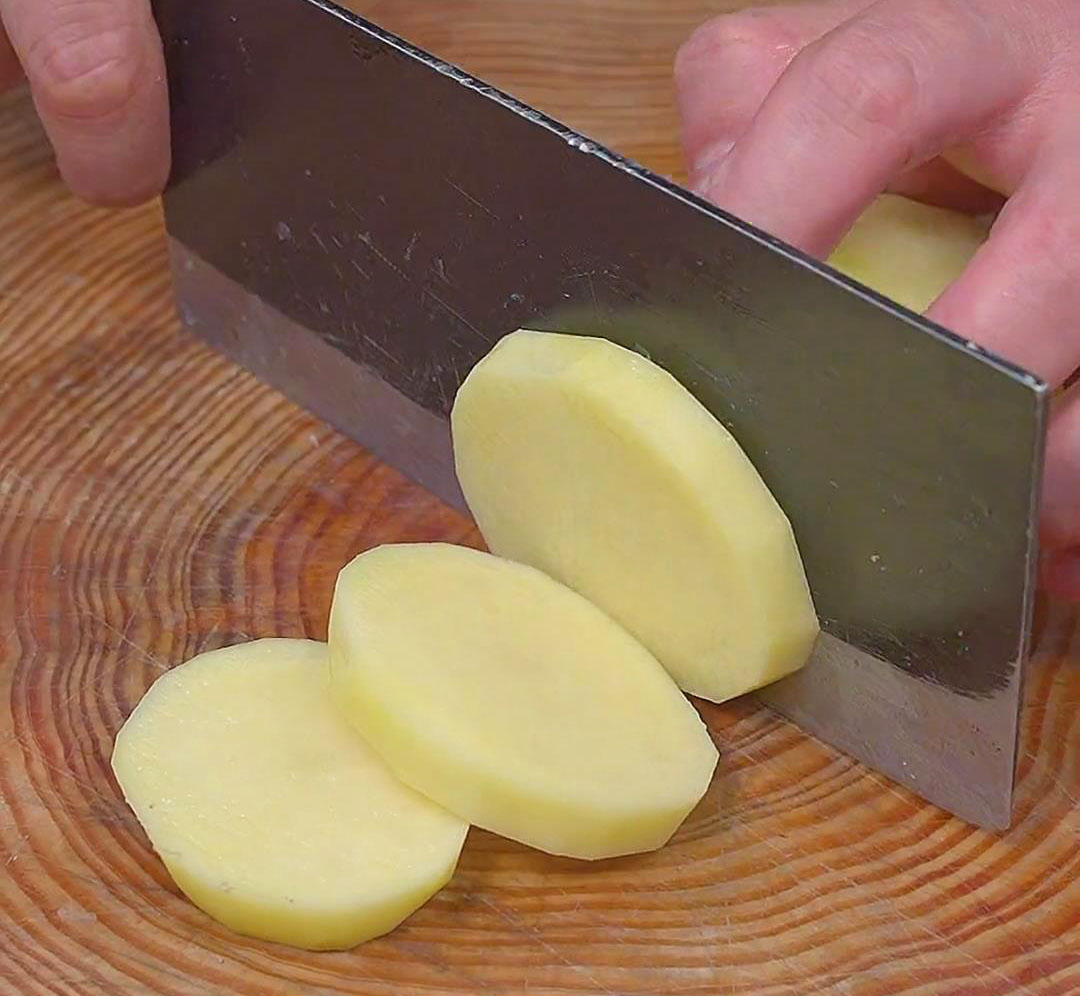 Start by slicing potatoes