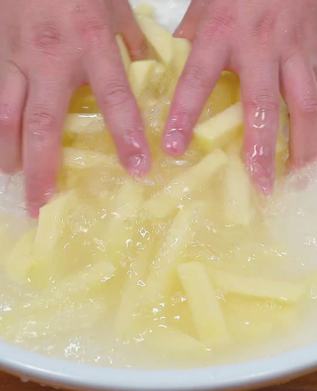 Wash the cut potatoes with water to remove the starch