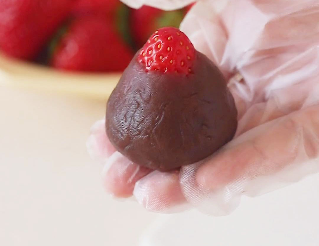 strawberry with a layer of red bean paste