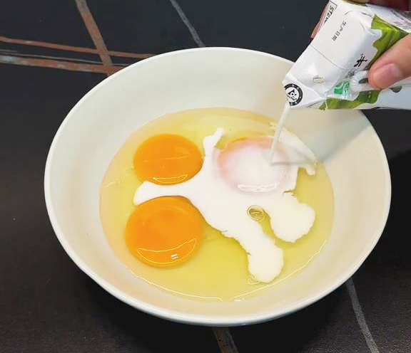 whisk together three eggs and 20ml of milk until well blended