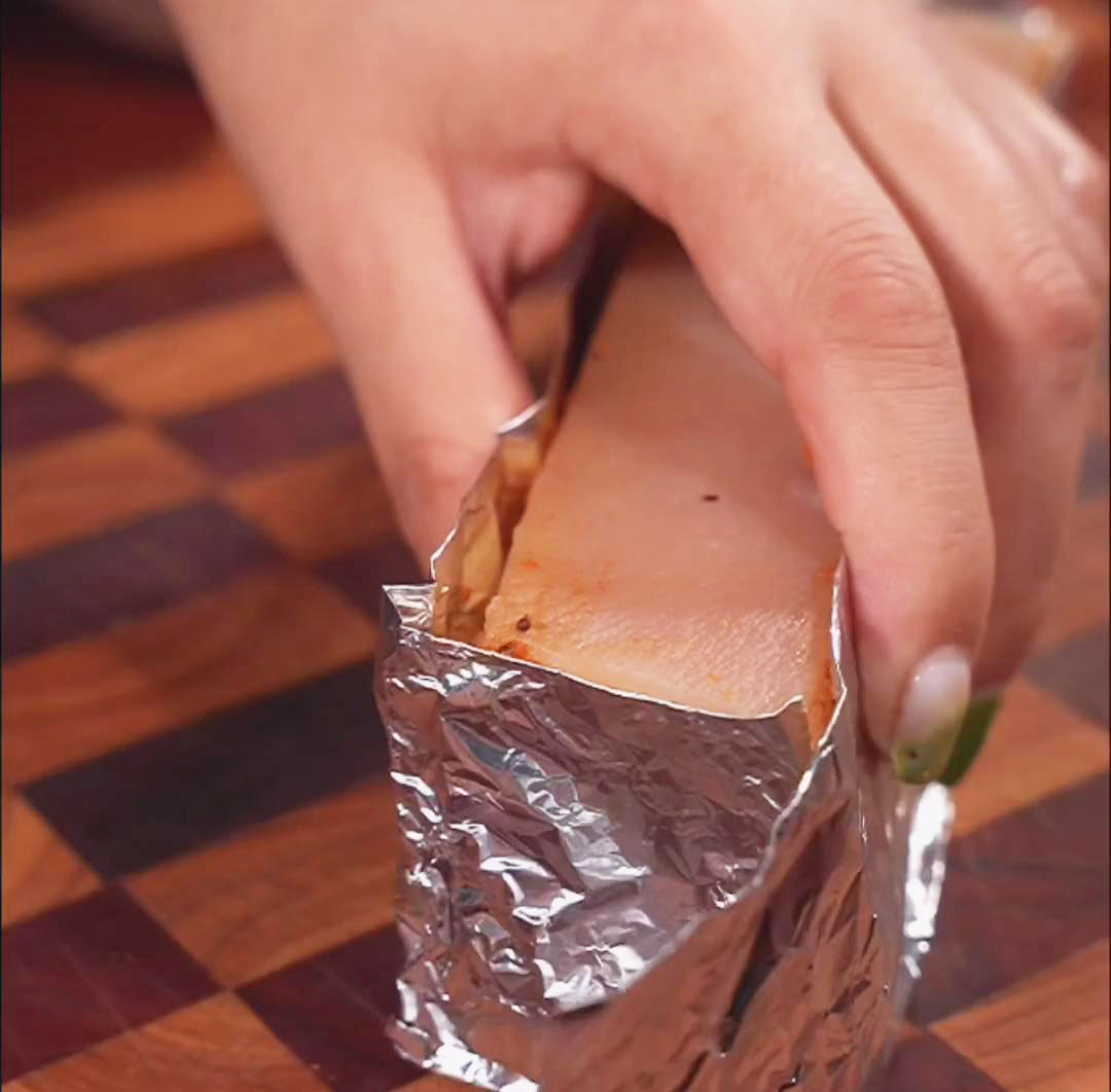 Wrap the sides of the pork belly with foil