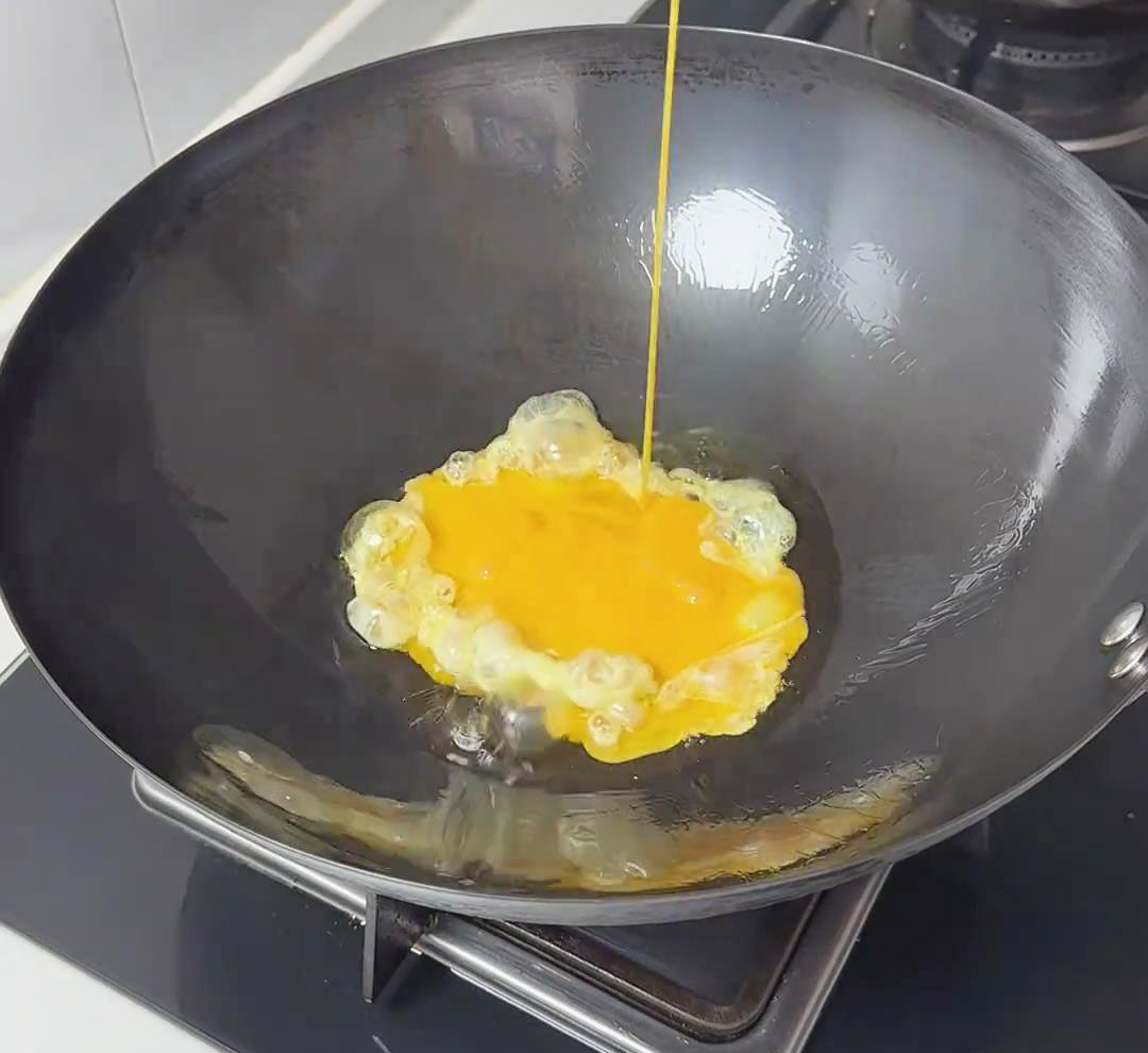 cook the 2 beaten eggs