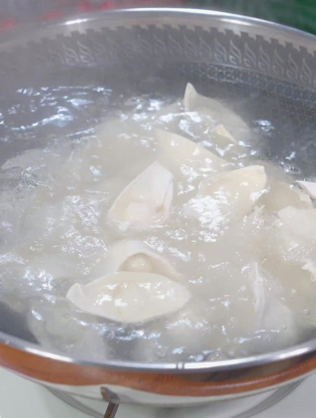 Bring water to a boil and cook the wontons until they float