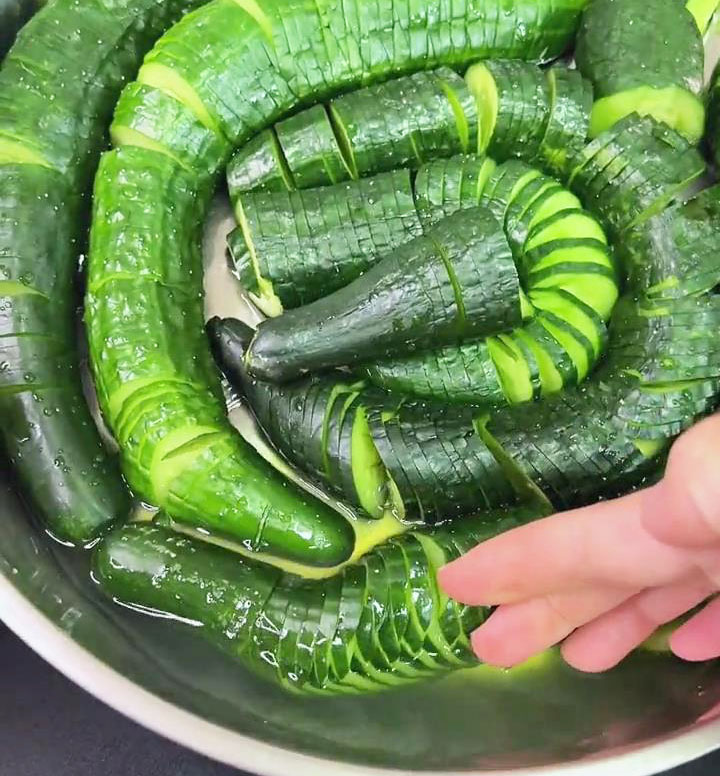 Drain the water from the marinated cucumber