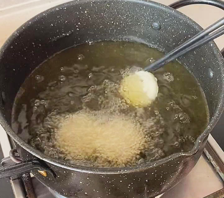 Fry the potatoes in hot oil at 356°F until golden brown