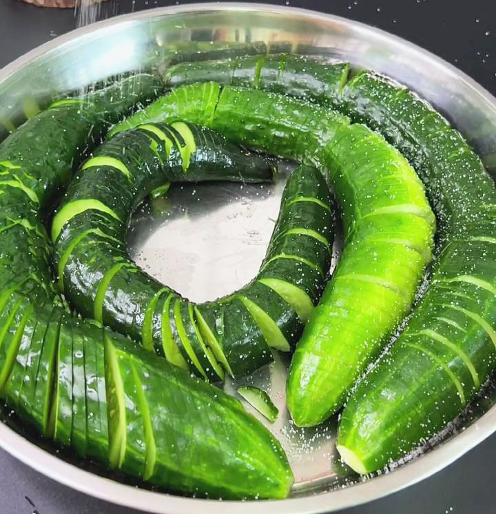 Sprinkle about a tablespoon of salt and spread it evenly onto the cucumbers