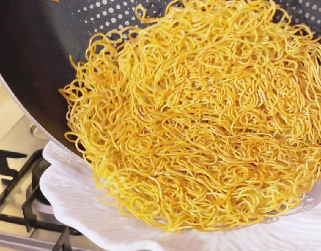 Transfer the pan fried noodles to your chosen serving plate