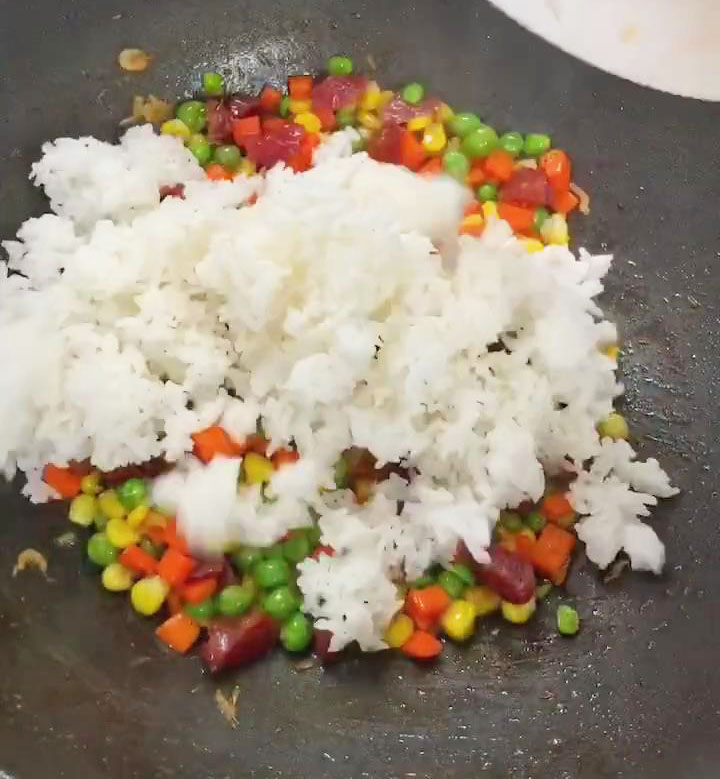 add the rice to the wok