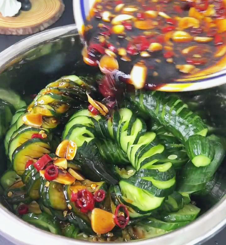 pour the dressing over the cucumbers