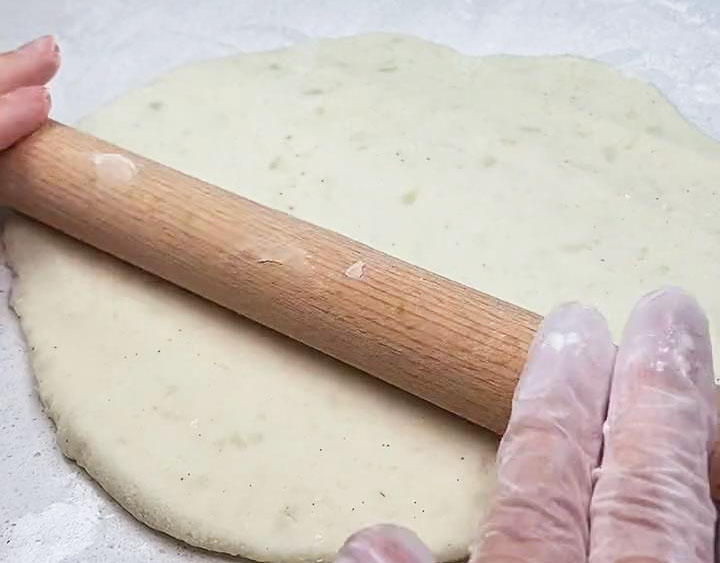 roll the mixture into a thin sheet