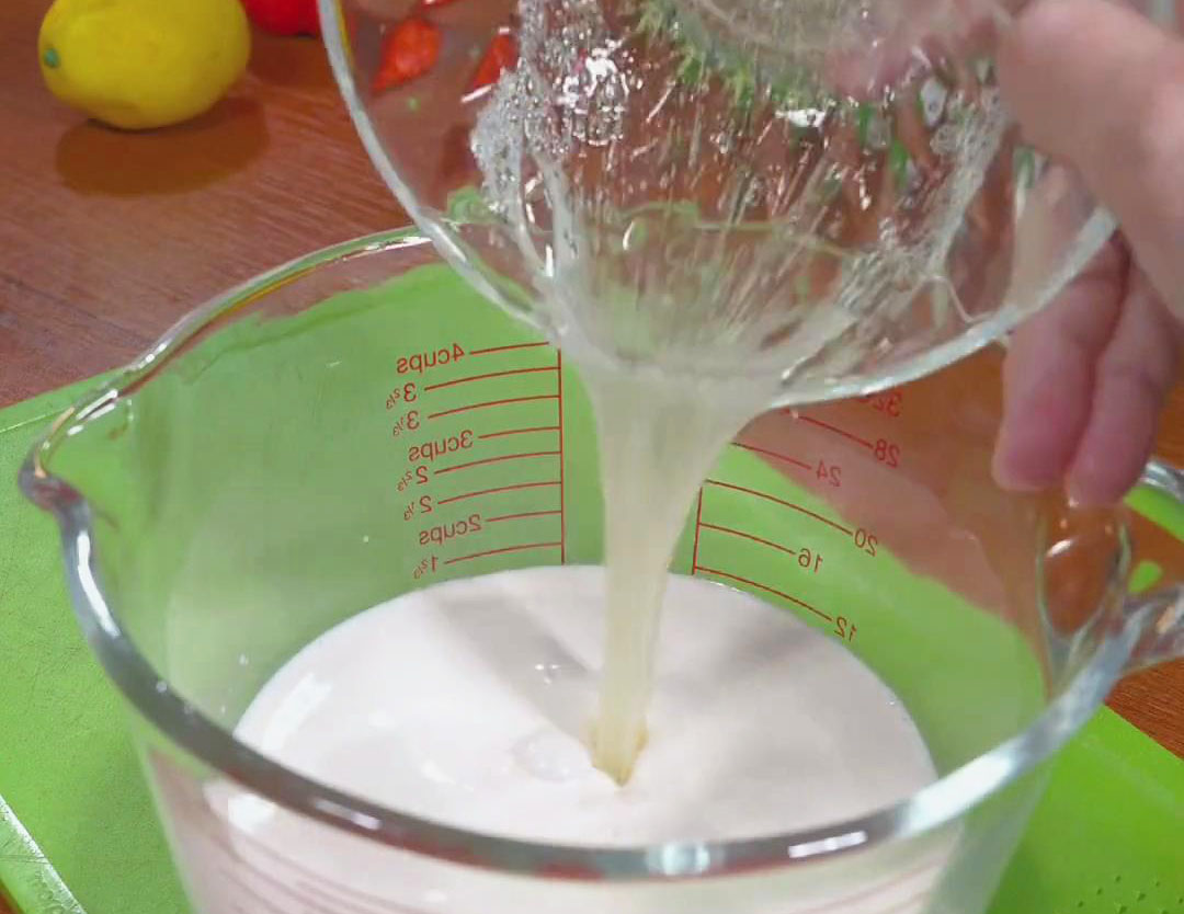 Pour the egg white mixture into the cooled milk