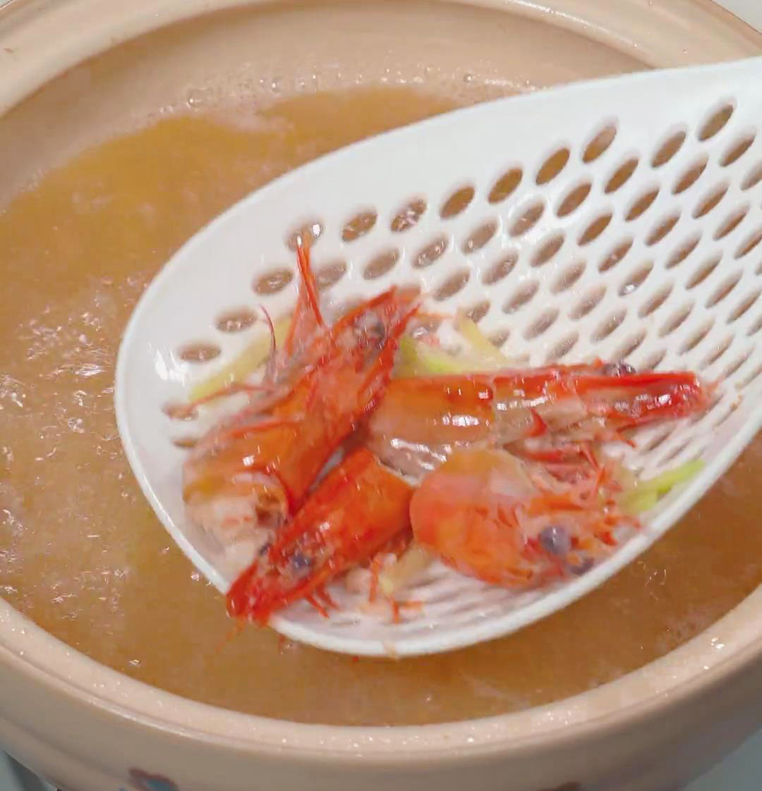 Remove the shrimp heads using a strainer