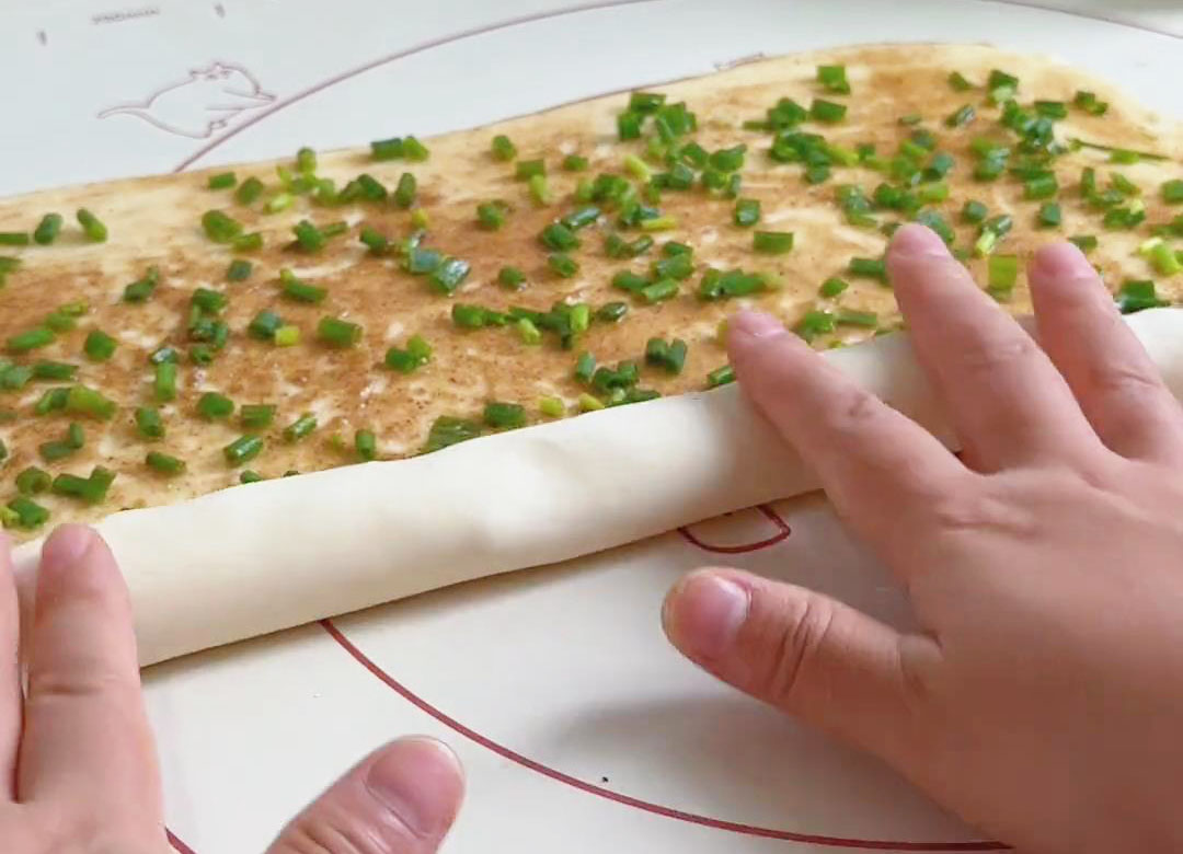 Roll up the dough with the filling side inside
