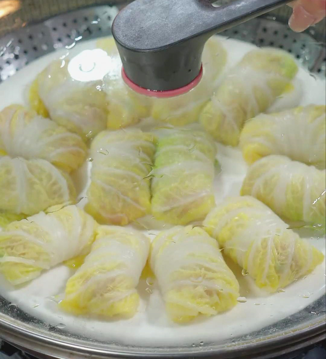 Steam cabbage rolls in a steamer for 8 minutes
