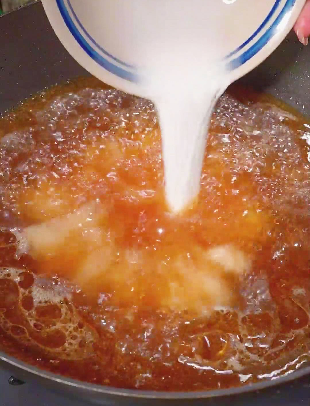 gradually pour the cornstarch slurry white continuously stirring