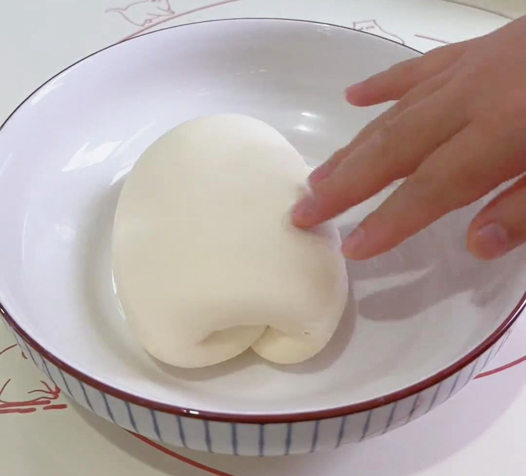 knead it into a smooth ball of dough