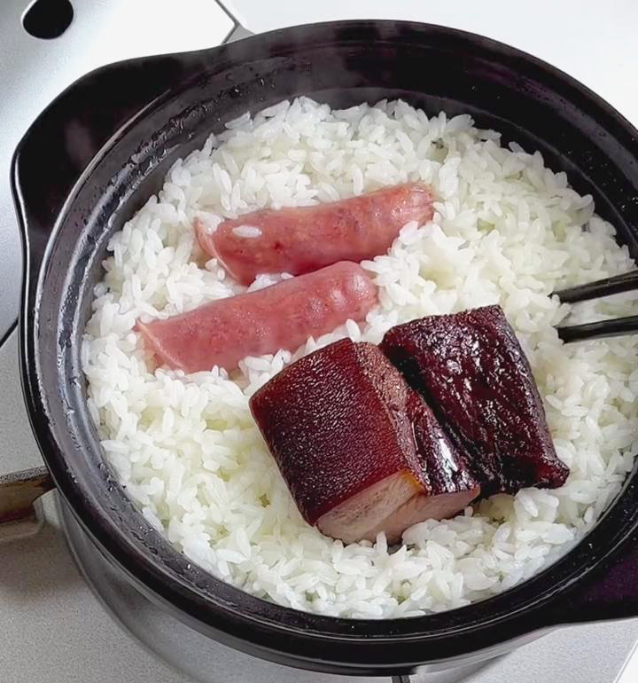 poke a few holes in the rice using chopsticks