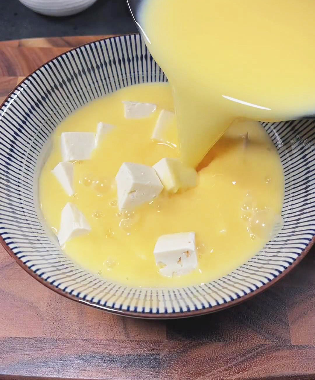 pour the egg mixture over the tofu