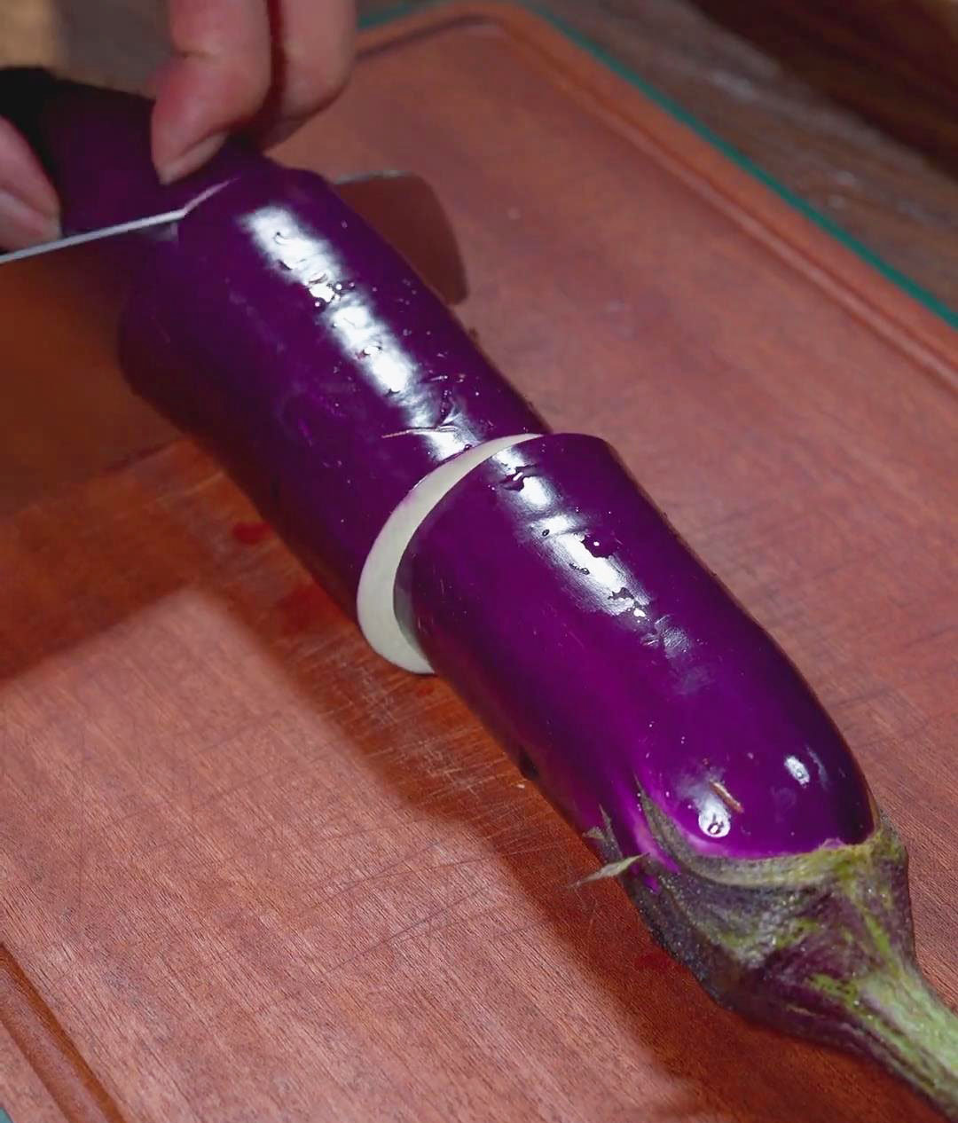 Cut the eggplant into 3 pieces