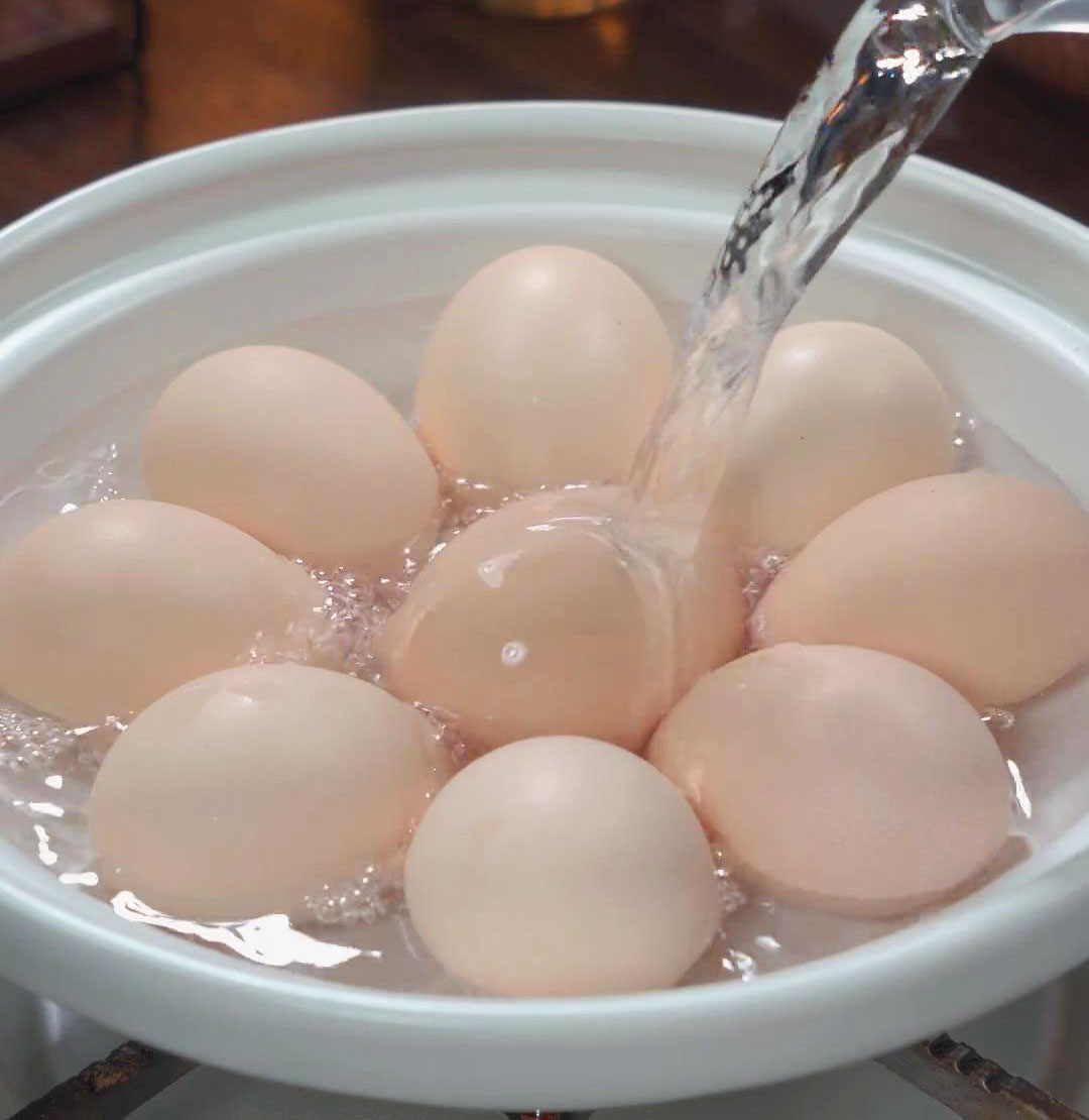 Place the eggs in a pot and fill it with cold water