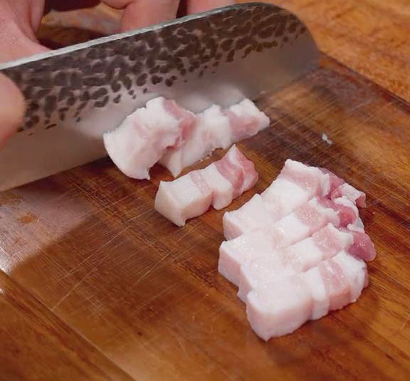 Slice the pork belly into strips