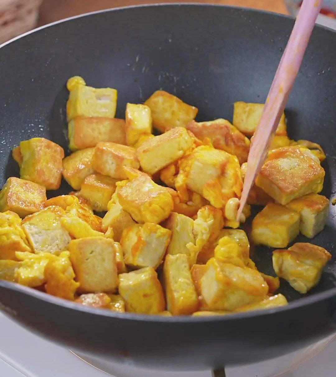 fry the tofu with eggs until golden yellow