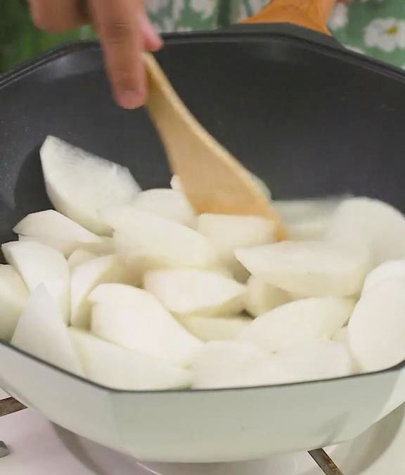 stir fry the daikon radish for about a minute
