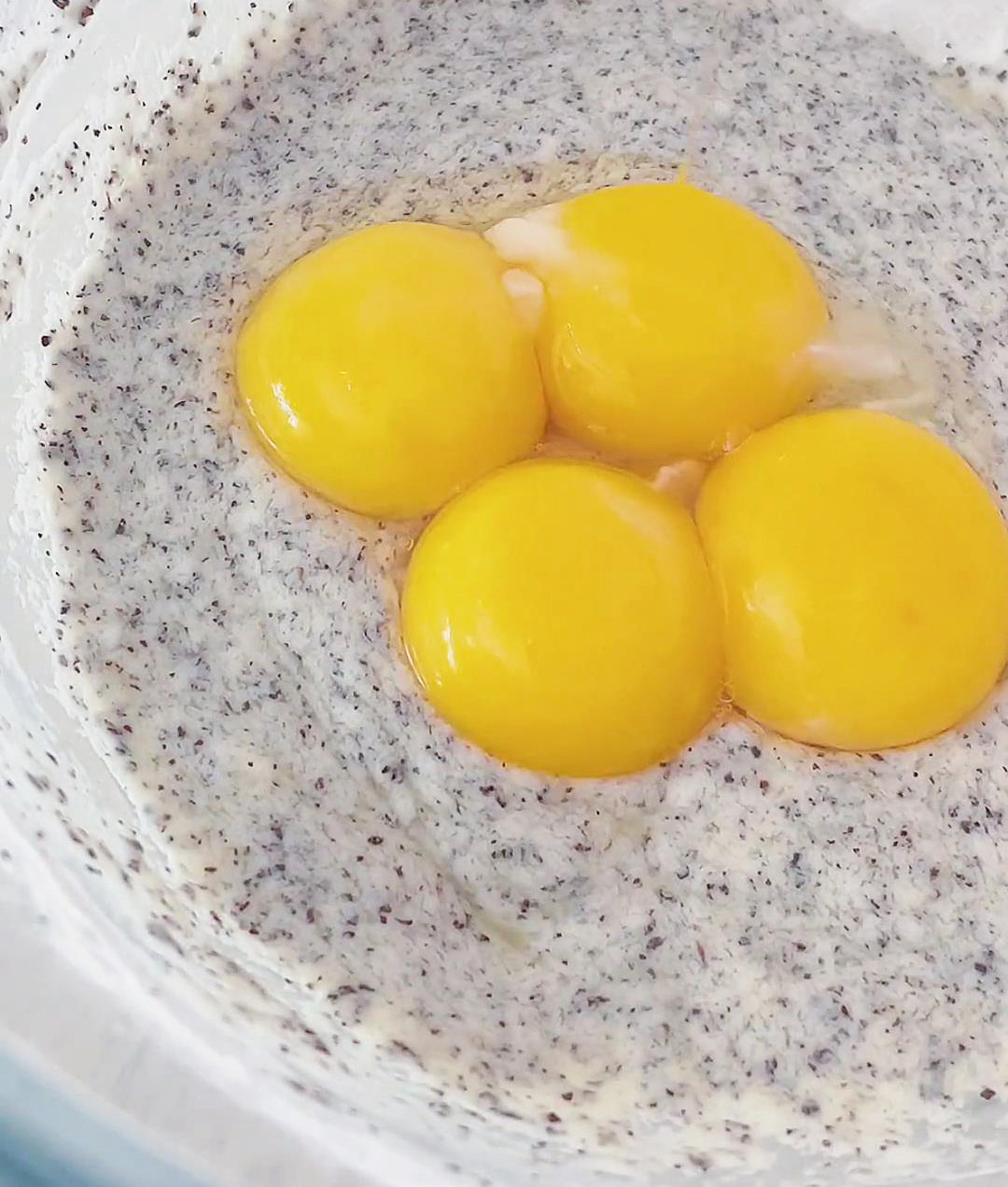 Add 4 egg yolks to the batter and whisk in a Z shaped motion