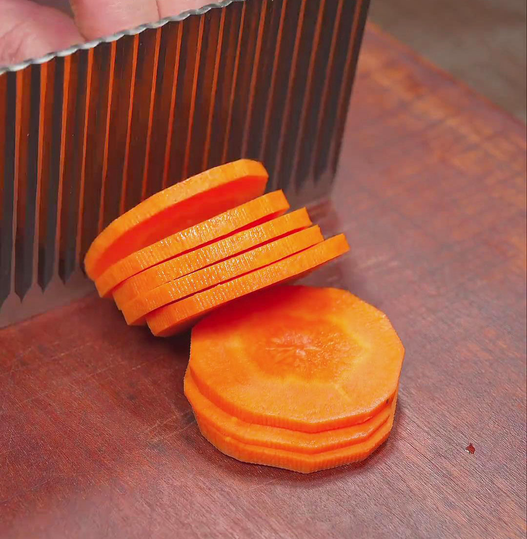 Chop the carrots into thin slices