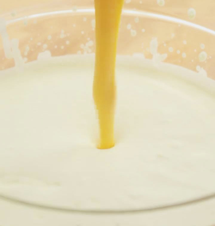 Combine the cooled egg yolk and milk mixture with the whipped cream