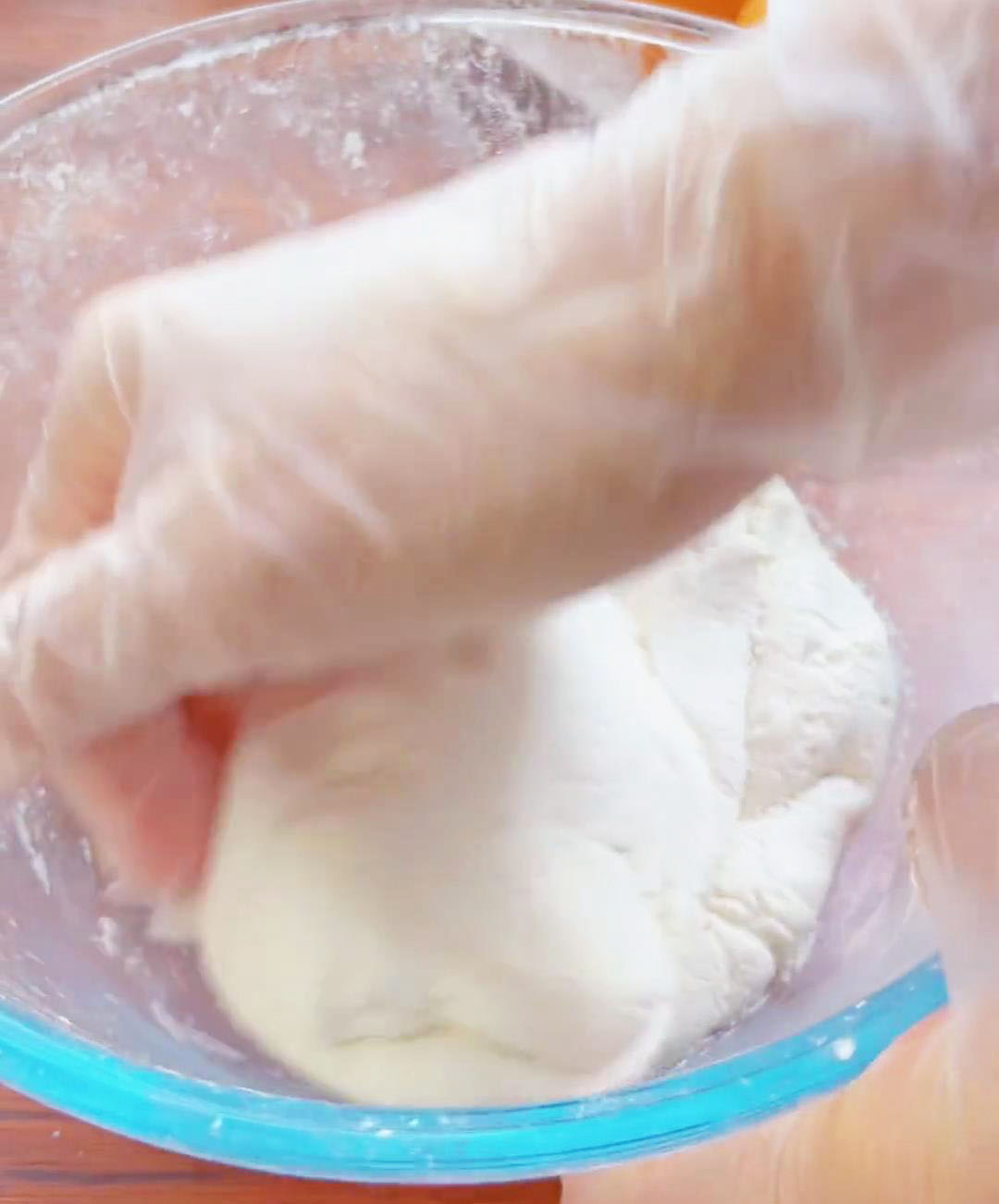 Continue stirring and kneading until a smooth and non sticky dough forms
