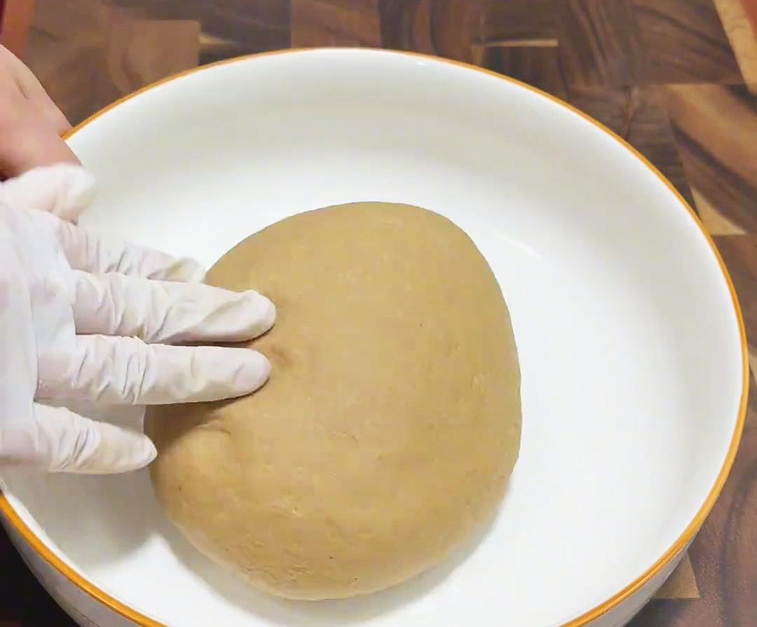 Knead the dough until it becomes smooth and elastic