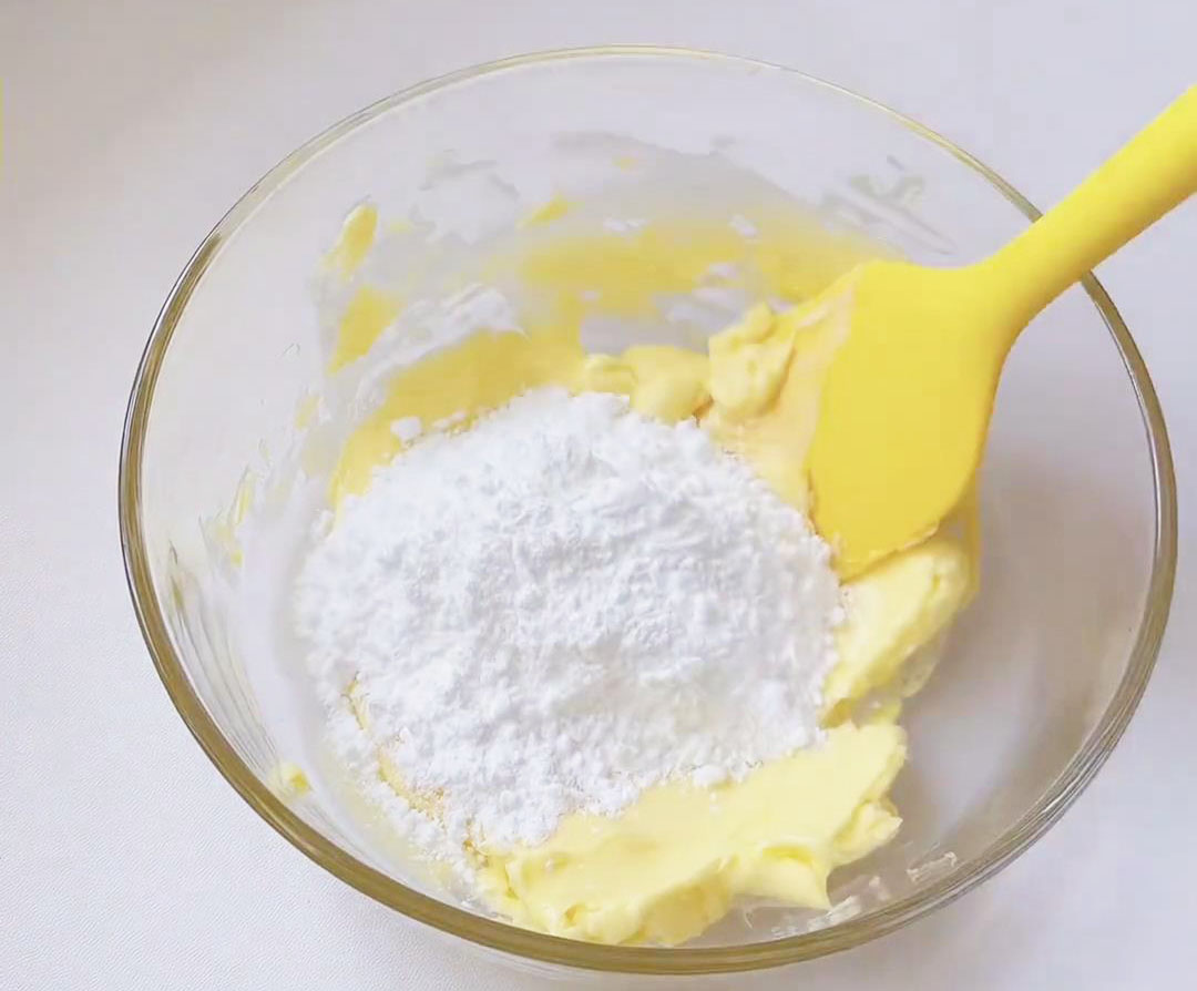 Mix the softened butter and powdered sugar