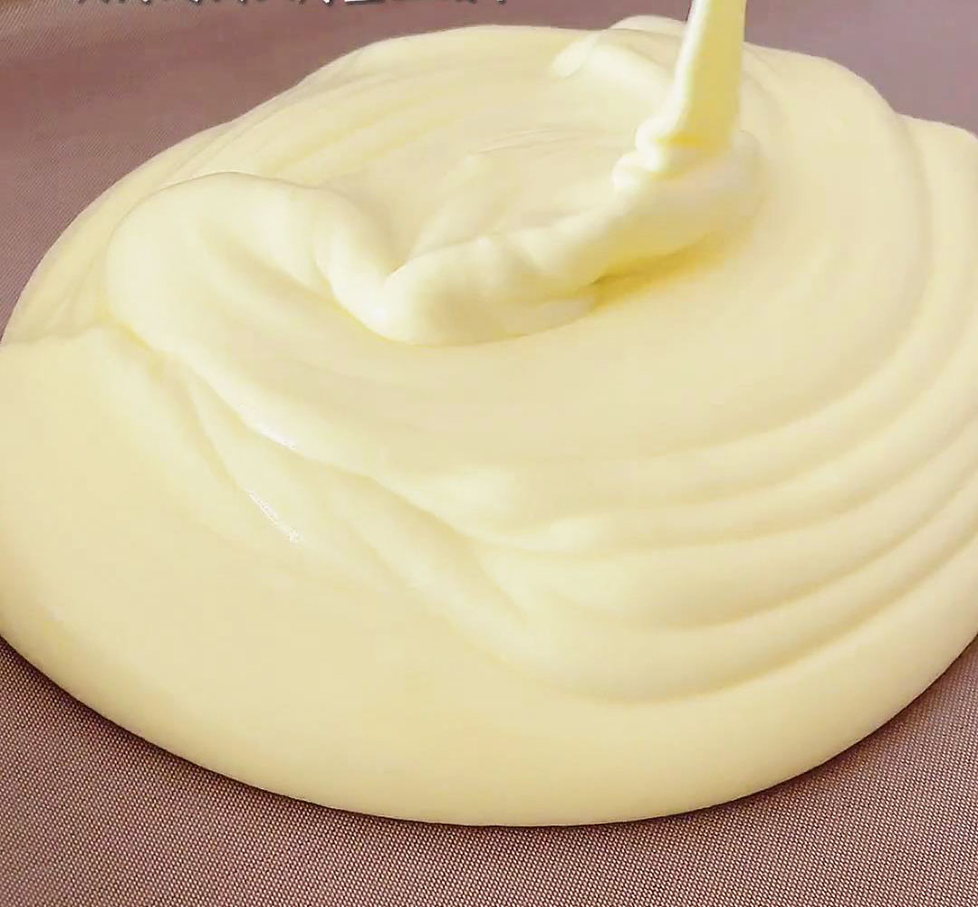 Pour the batter onto a baking tray lined with parchment paper