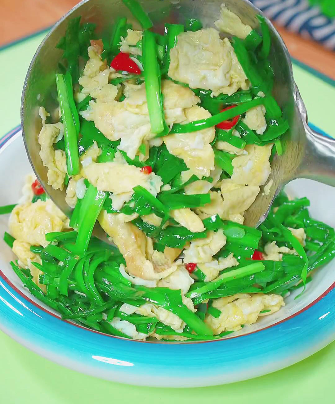 Transfer the Chinese chive and egg stir fry to a serving dish